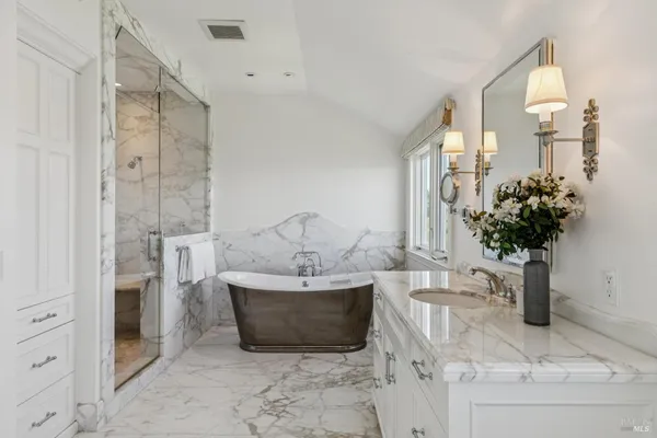 a view of a balcony with wooden floor