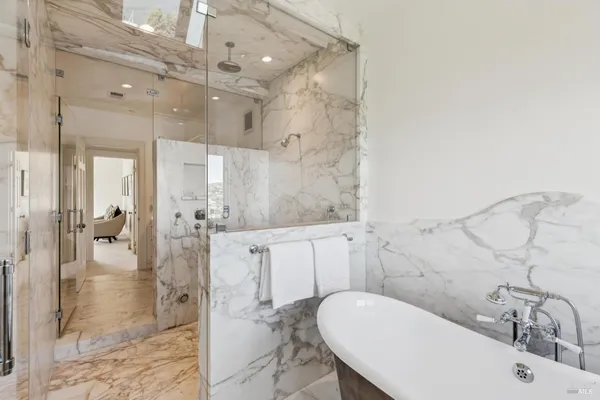 an aerial view of a house with a yard and garden