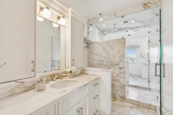 an aerial view of a house with swimming pool