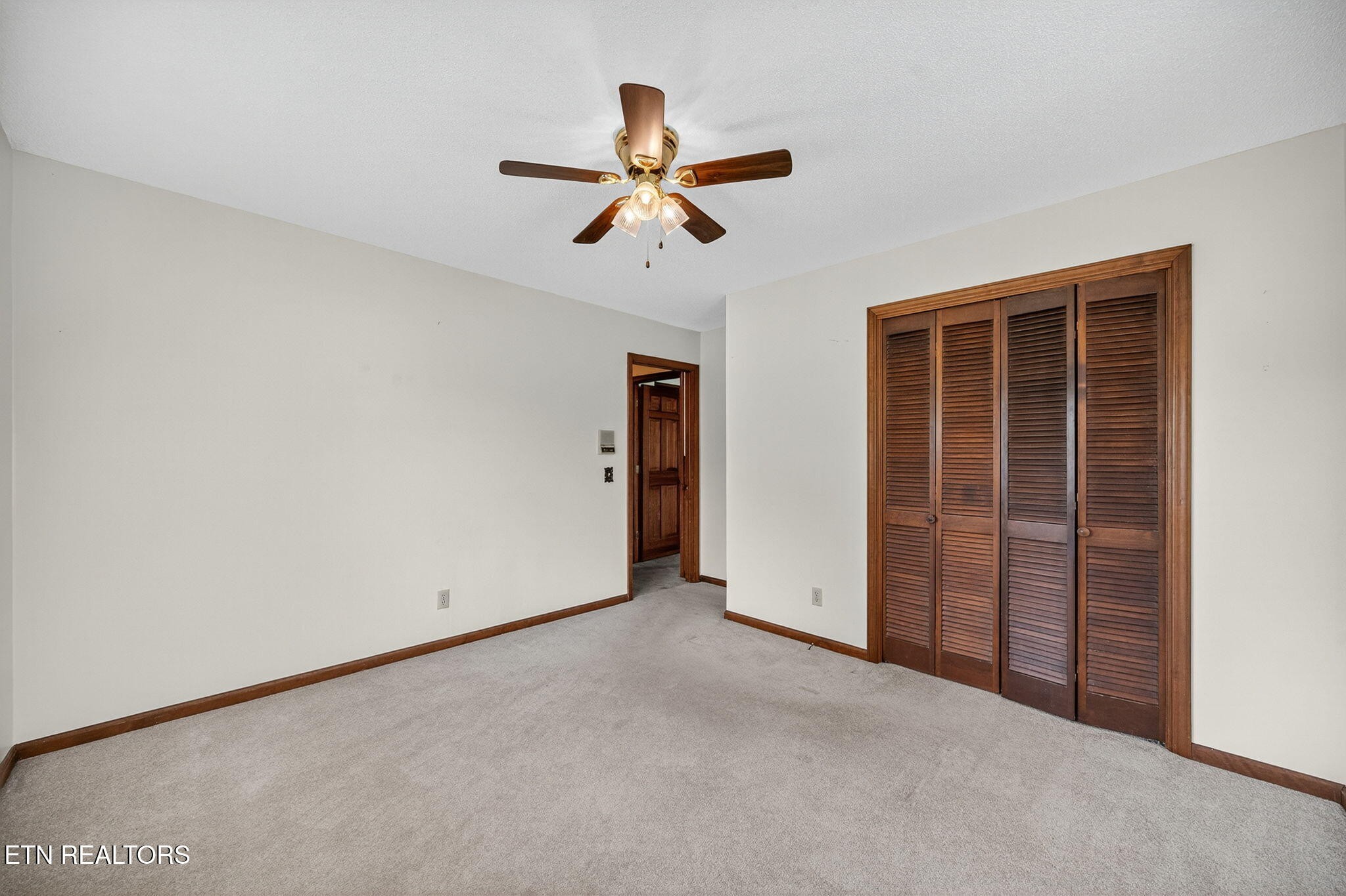 330 Hutsell Drive Decatur, TN 37322 - Photo 16 of 35 an empty room with closet and ceiling fan