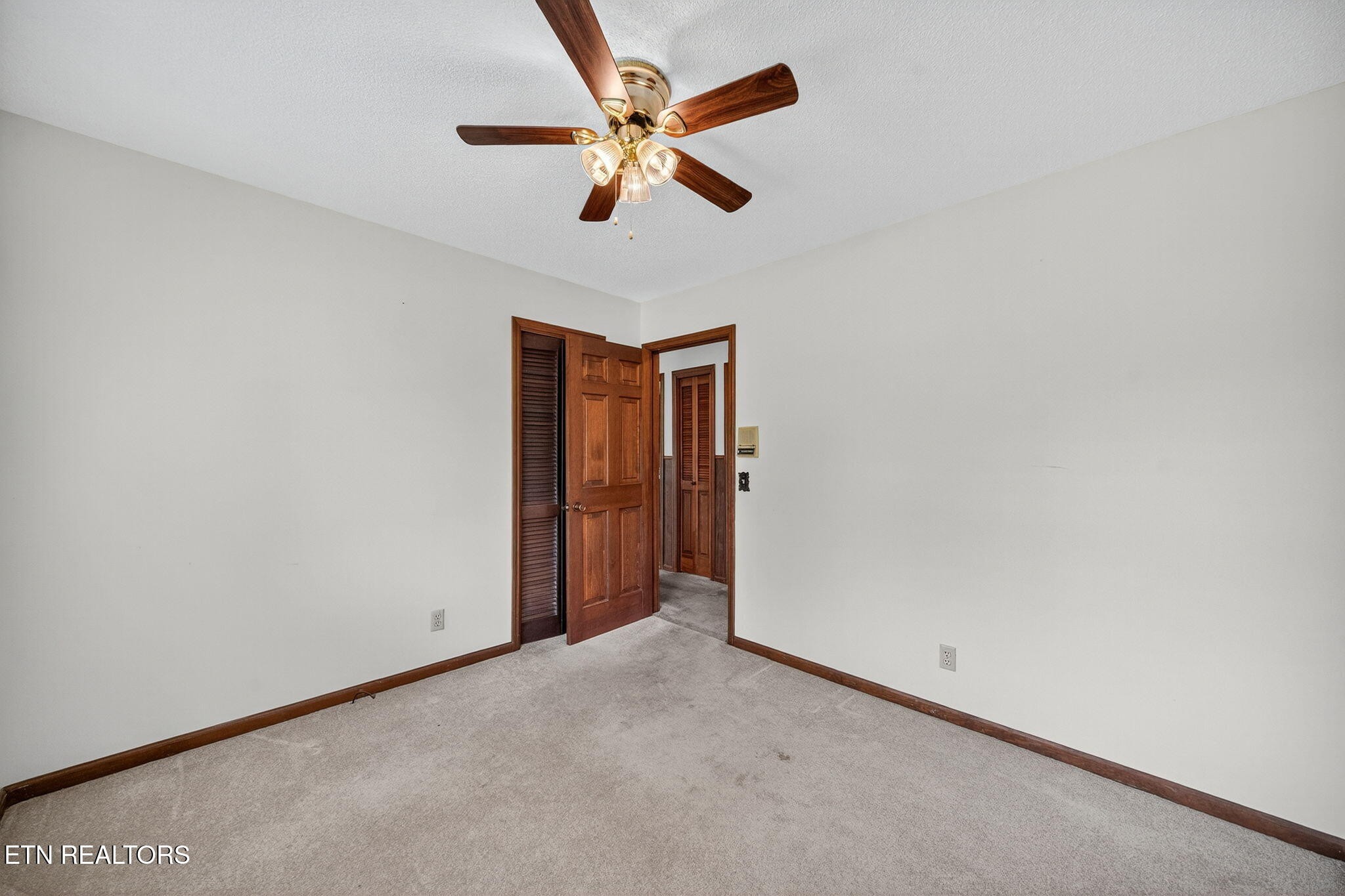 330 Hutsell Drive Decatur, TN 37322 - Photo 18 of 35 an empty room with closet and fan