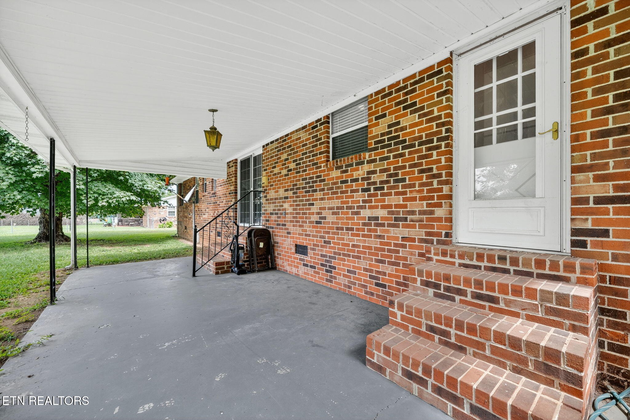 330 Hutsell Drive Decatur, TN 37322 - Photo 26 of 35 a view of a house with a porch