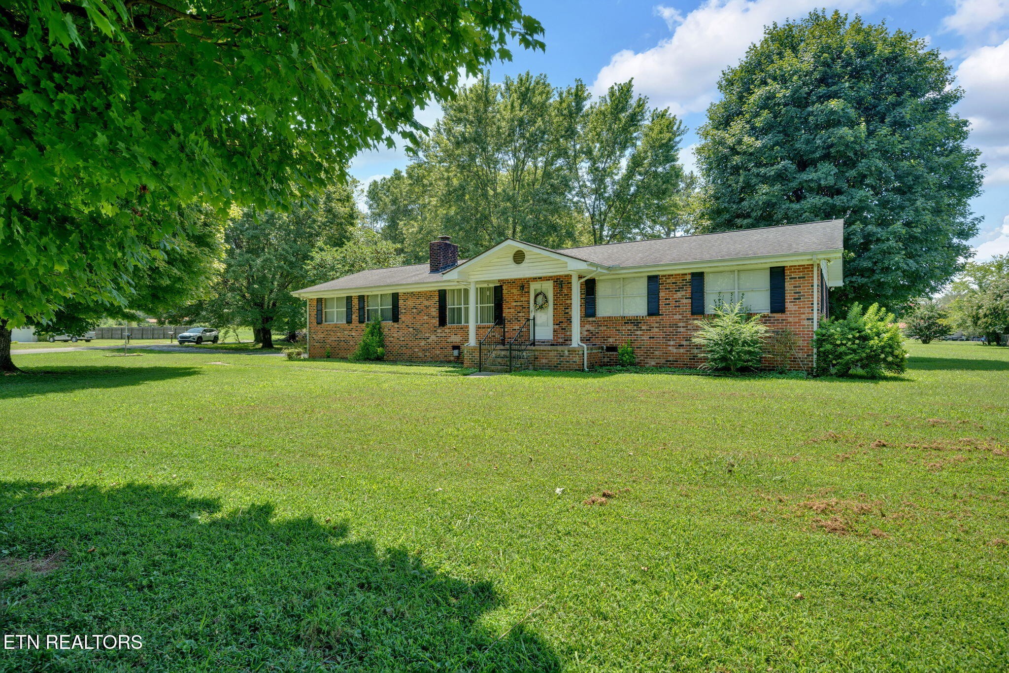 330 Hutsell Drive Decatur, TN 37322 - Photo 3 of 35 a front view of house with yard and green space