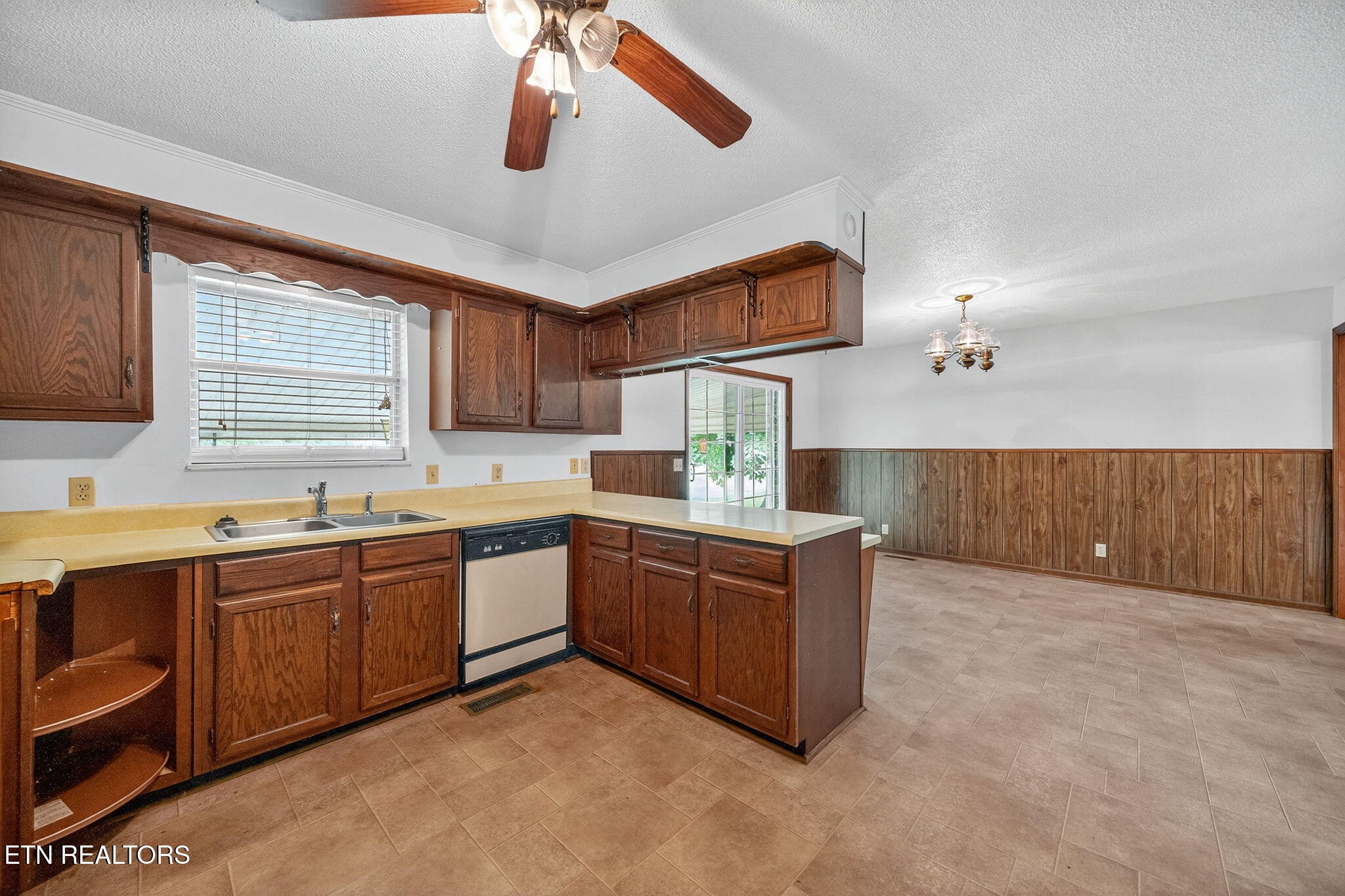 330 Hutsell Drive Decatur, TN 37322 - Photo 9 of 35 a kitchen with stainless steel appliances granite countertop a sink and cabinets