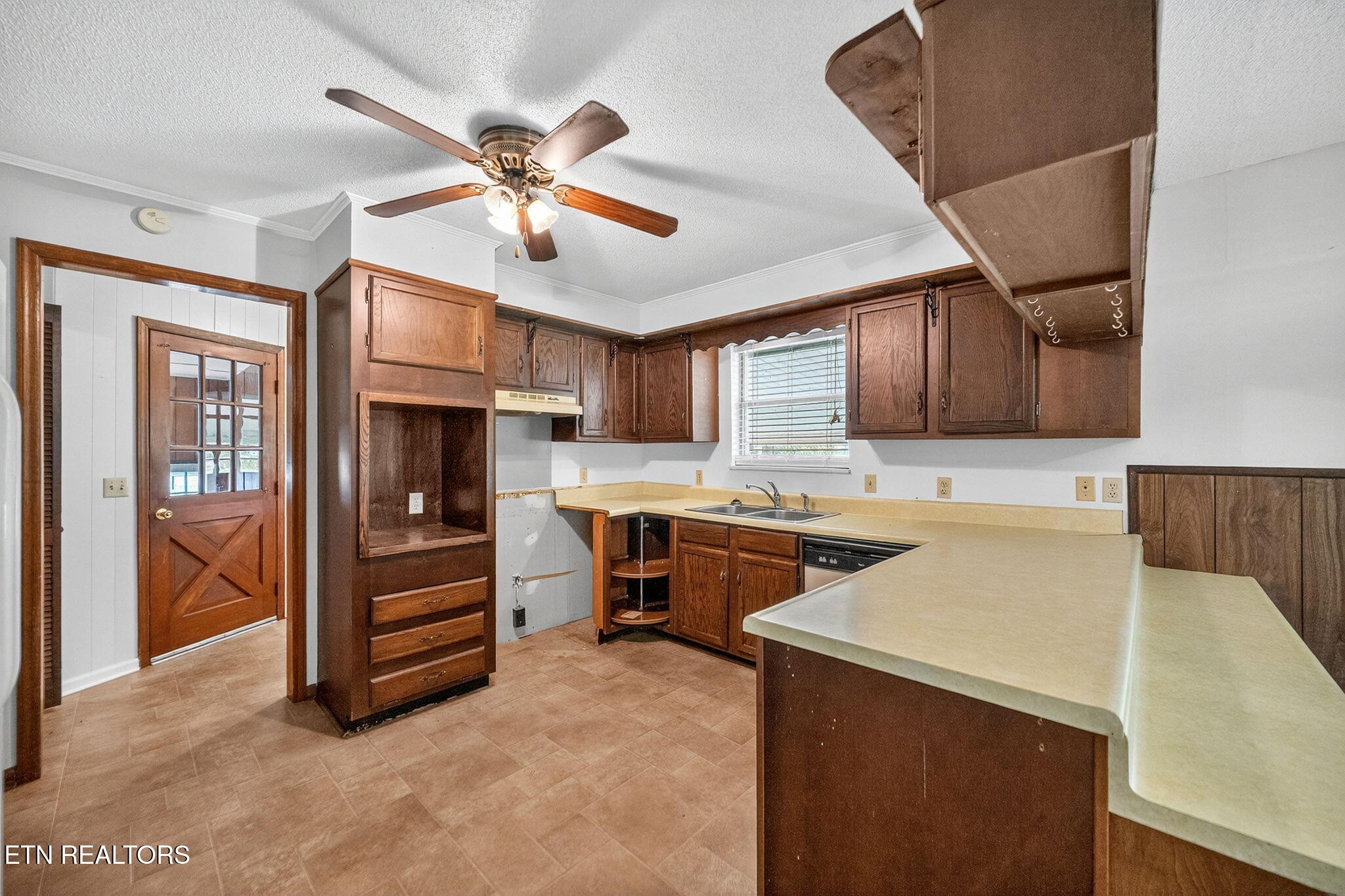 330 Hutsell Drive Decatur, TN 37322 - Photo 10 of 35 a kitchen with stainless steel appliances a stove a sink and cabinets