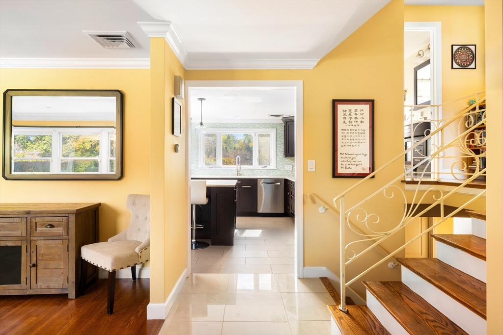 45 Brandeis Road Newton, MA 02459 - Photo 3 of 12 a living room with furniture and a table
