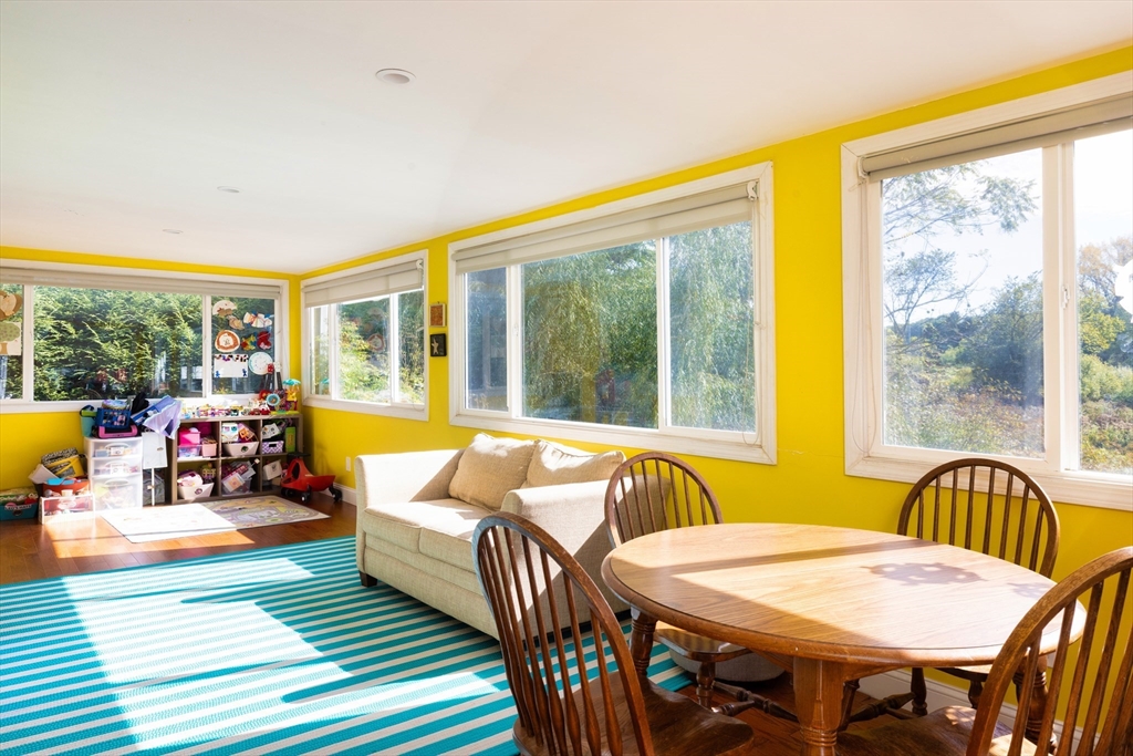 45 Brandeis Road Newton, MA 02459 - Photo 7 of 12 a living room with furniture and a large window
