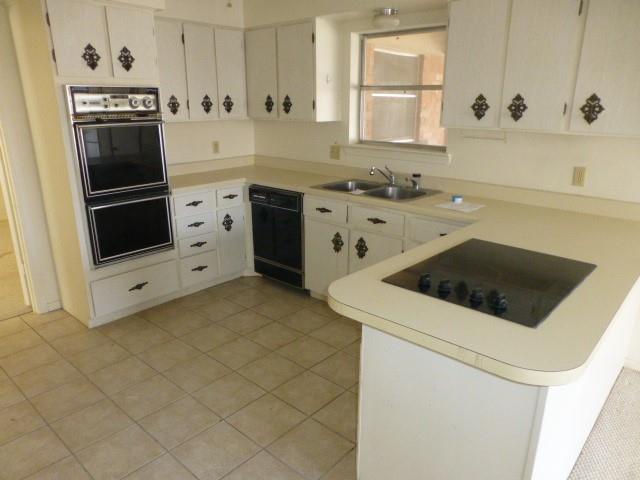 4612 Ranch View Road Fort Worth, TX 76109 - Photo 12 of 17 a kitchen with granite countertop a sink stove and refrigerator