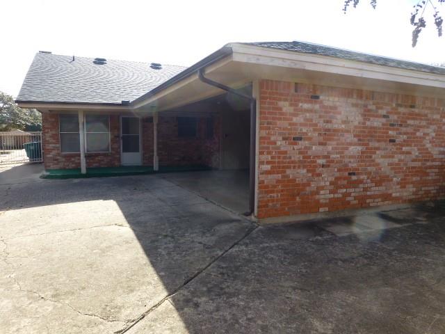 4612 Ranch View Road Fort Worth, TX 76109 - Photo 4 of 17 a front view of a house with a yard