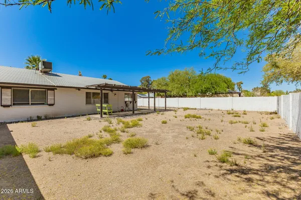 a view of a house with a snow in the yard