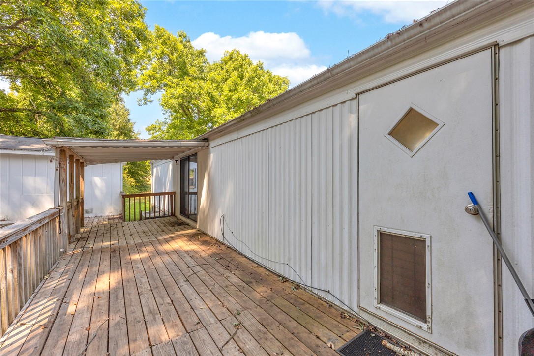 150 Newberry Road Walhalla, SC 29691 - Photo 27 of 47 A spacious wooden deck extends from the residence, perfect for enjoying outdoor moments.