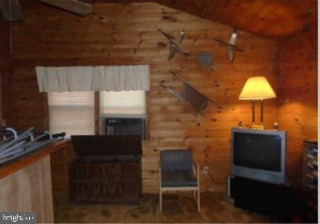 462 Trout Stream Road Lost City, WV 26810 - Photo 8 of 16 a table and chairs in a room