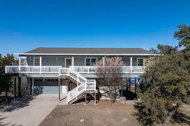 a house view with a garden space