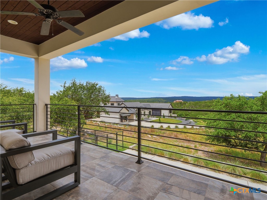5913 Verden Ridge New Braunfels, TX 78132 - Photo 14 of 48 a view of a two chairs in the roof deck