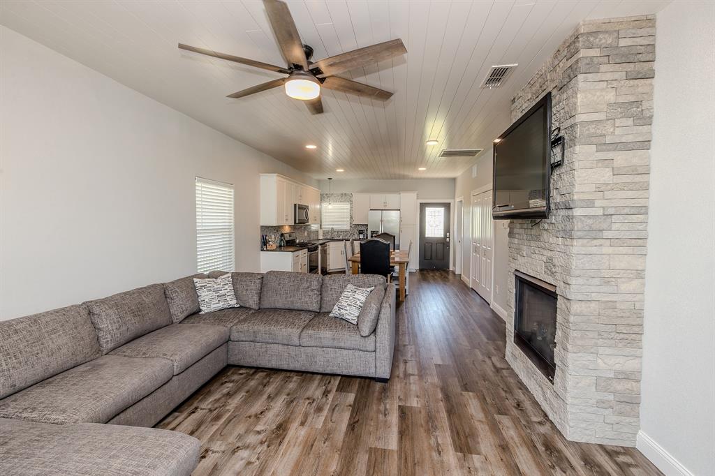 1525 McAdams Road, Unit C Graford, TX 76449 - Photo 15 of 38 Easy care flooring throughout makes this space even better!