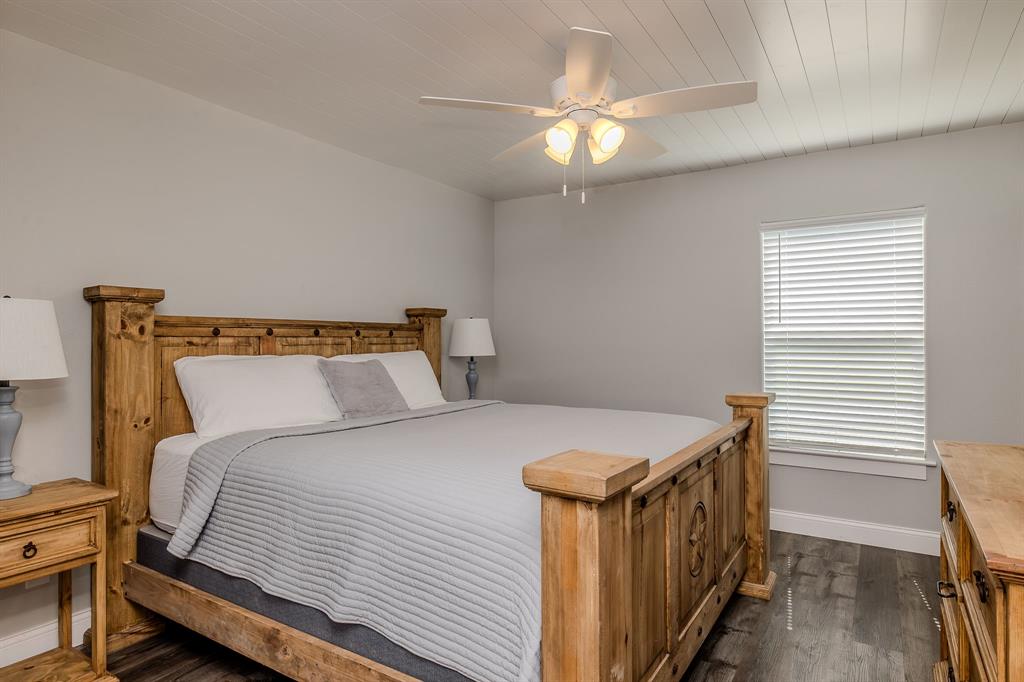 1525 McAdams Road, Unit C Graford, TX 76449 - Photo 16 of 38 Bedroom 1 features an en-suite bath.