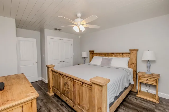 a bathroom with a shower sink and mirror