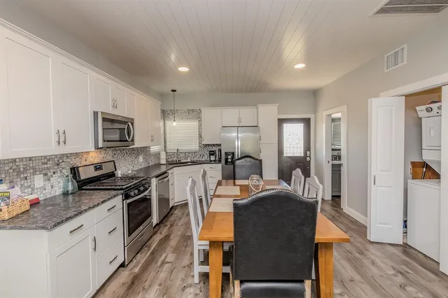 a view of a dining room with furniture