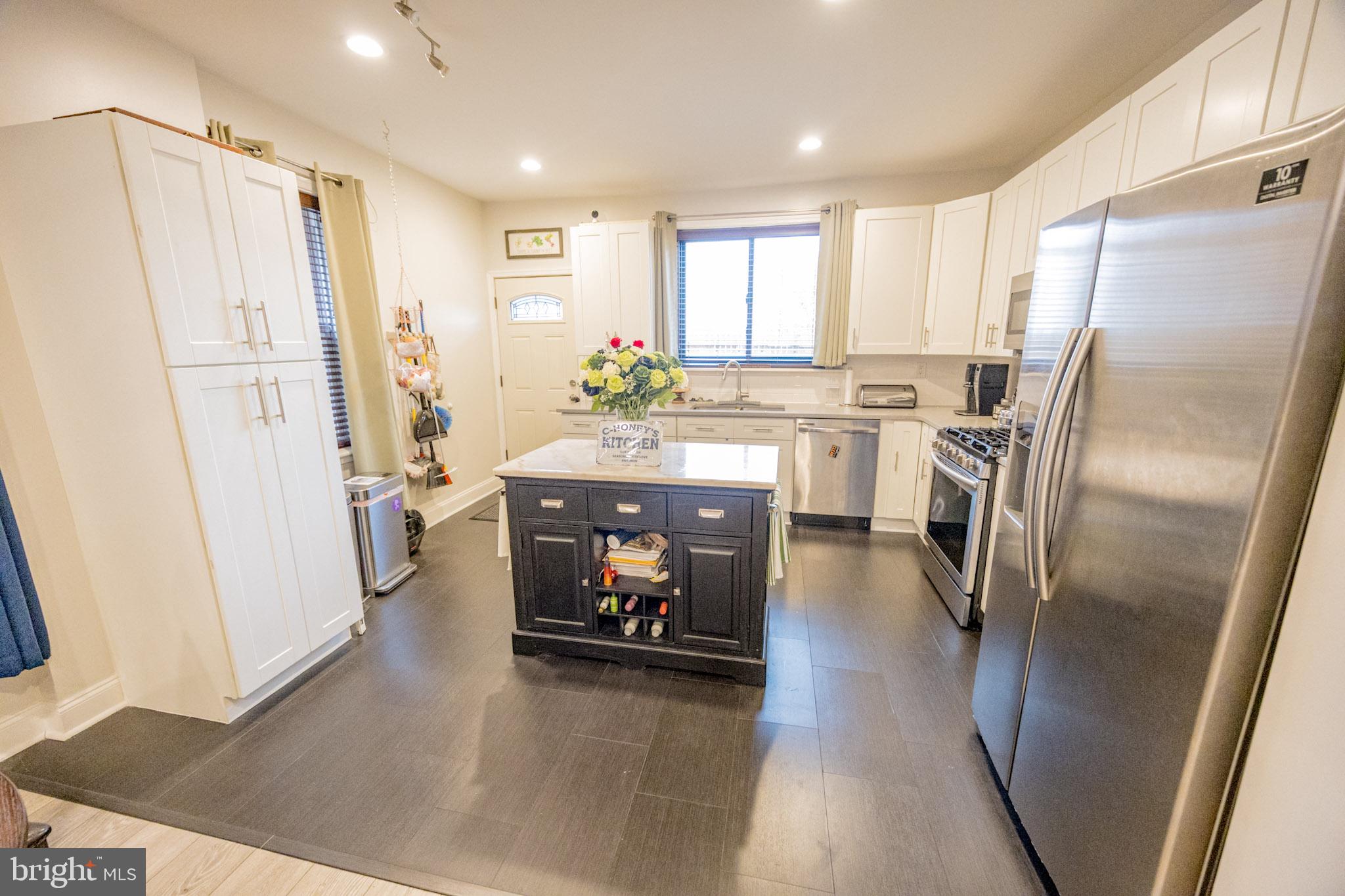 6113 Ross Street Philadelphia, PA 19144 - Photo 20 of 40 a kitchen with counter top space and refrigerator