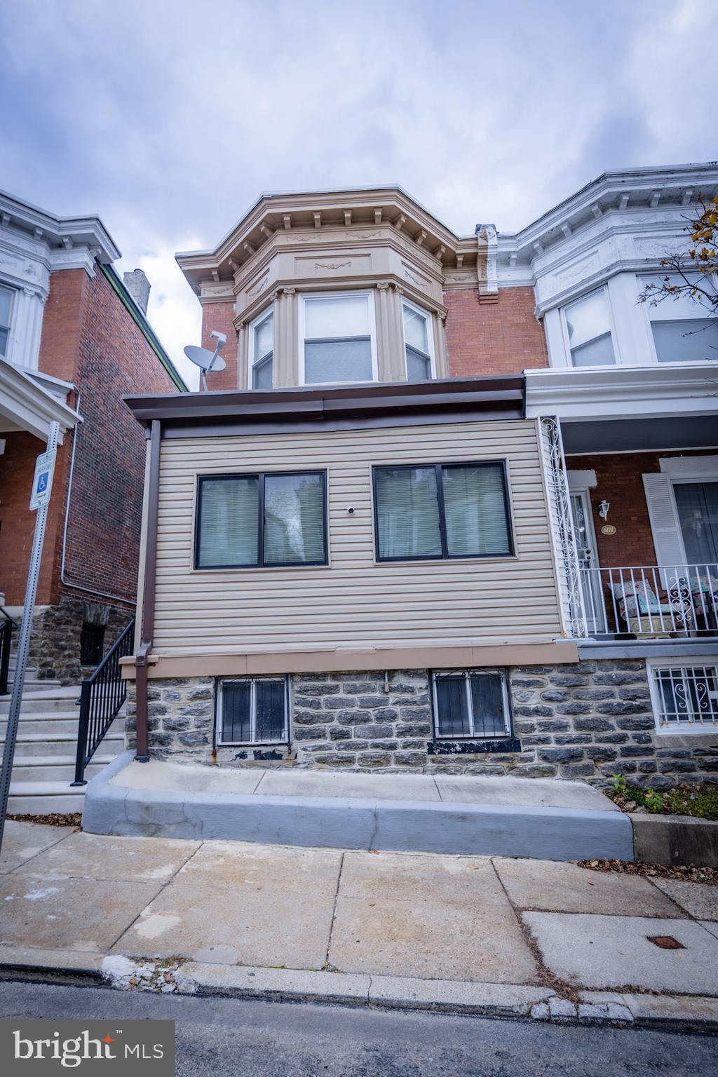 6113 Ross Street Philadelphia, PA 19144 - Photo 2 of 40 a front view of a house with a yard