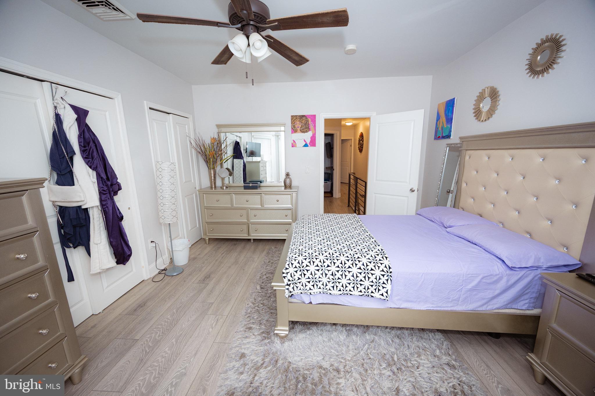 6113 Ross Street Philadelphia, PA 19144 - Photo 23 of 40 a bedroom with a bed and a walk in closet