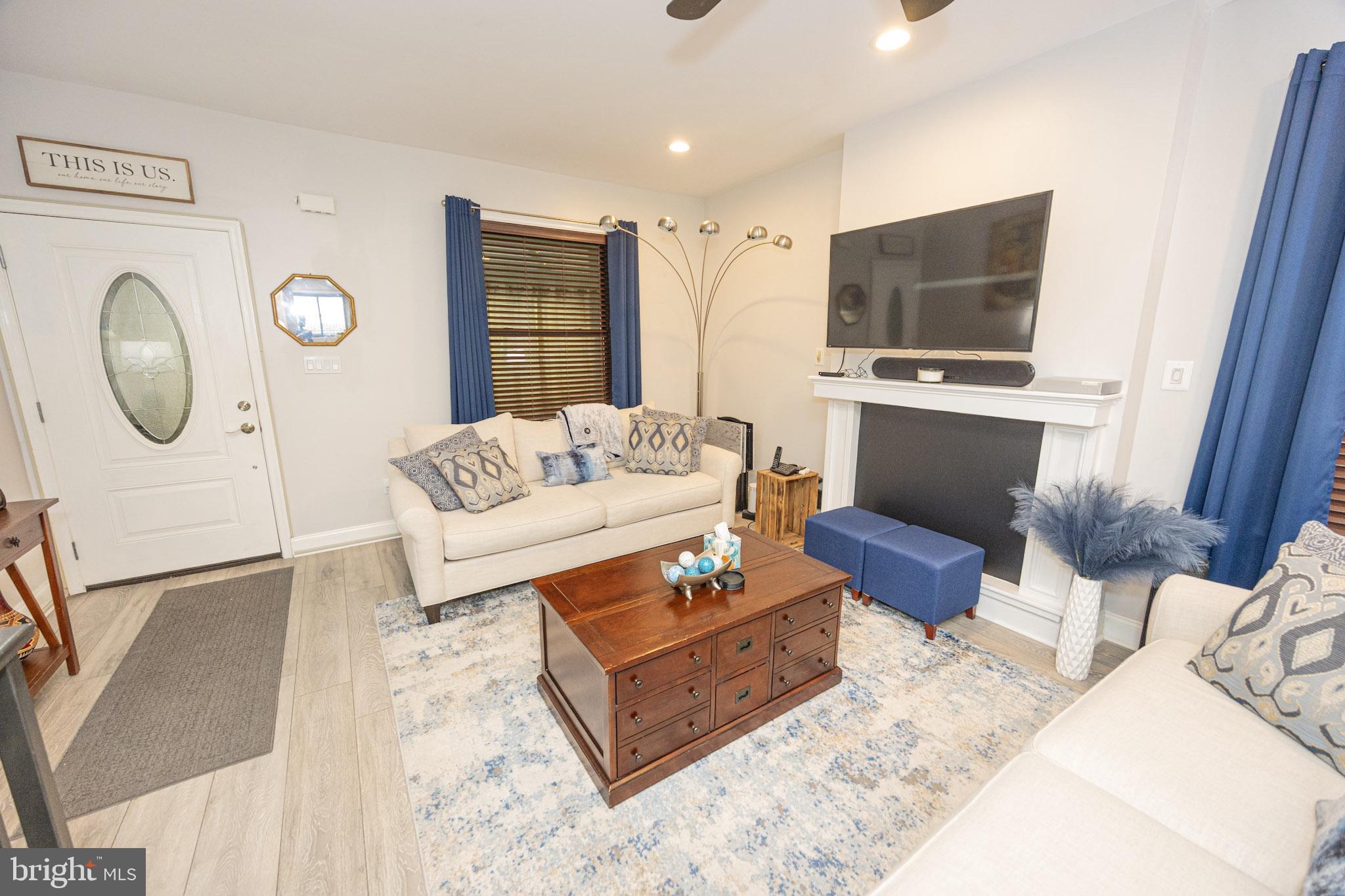 6113 Ross Street Philadelphia, PA 19144 - Photo 7 of 40 a living room with furniture and a flat screen tv