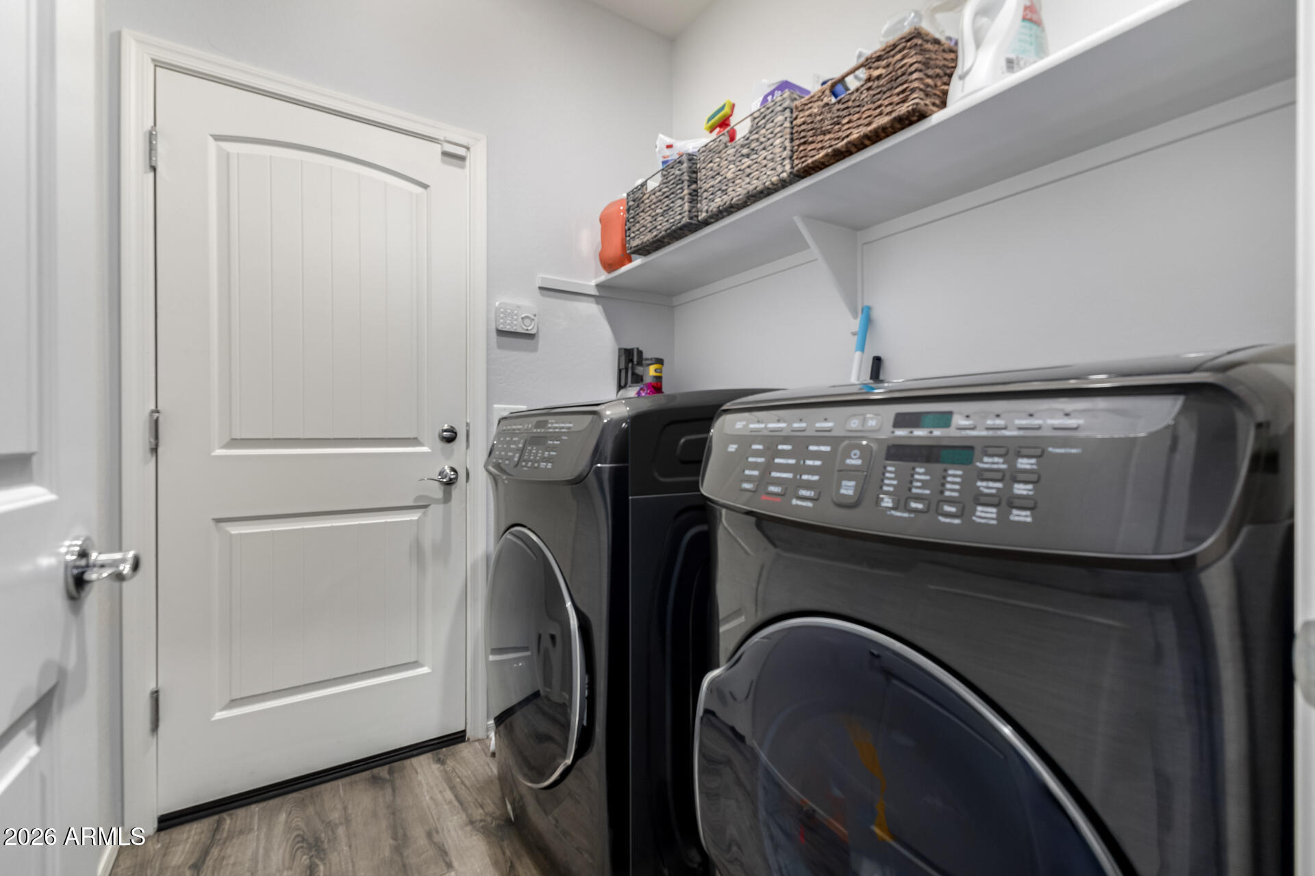 2929 West Laredo Lane Phoenix, AZ 85085 - Photo 23 of 28 a utility room with dryer and washer