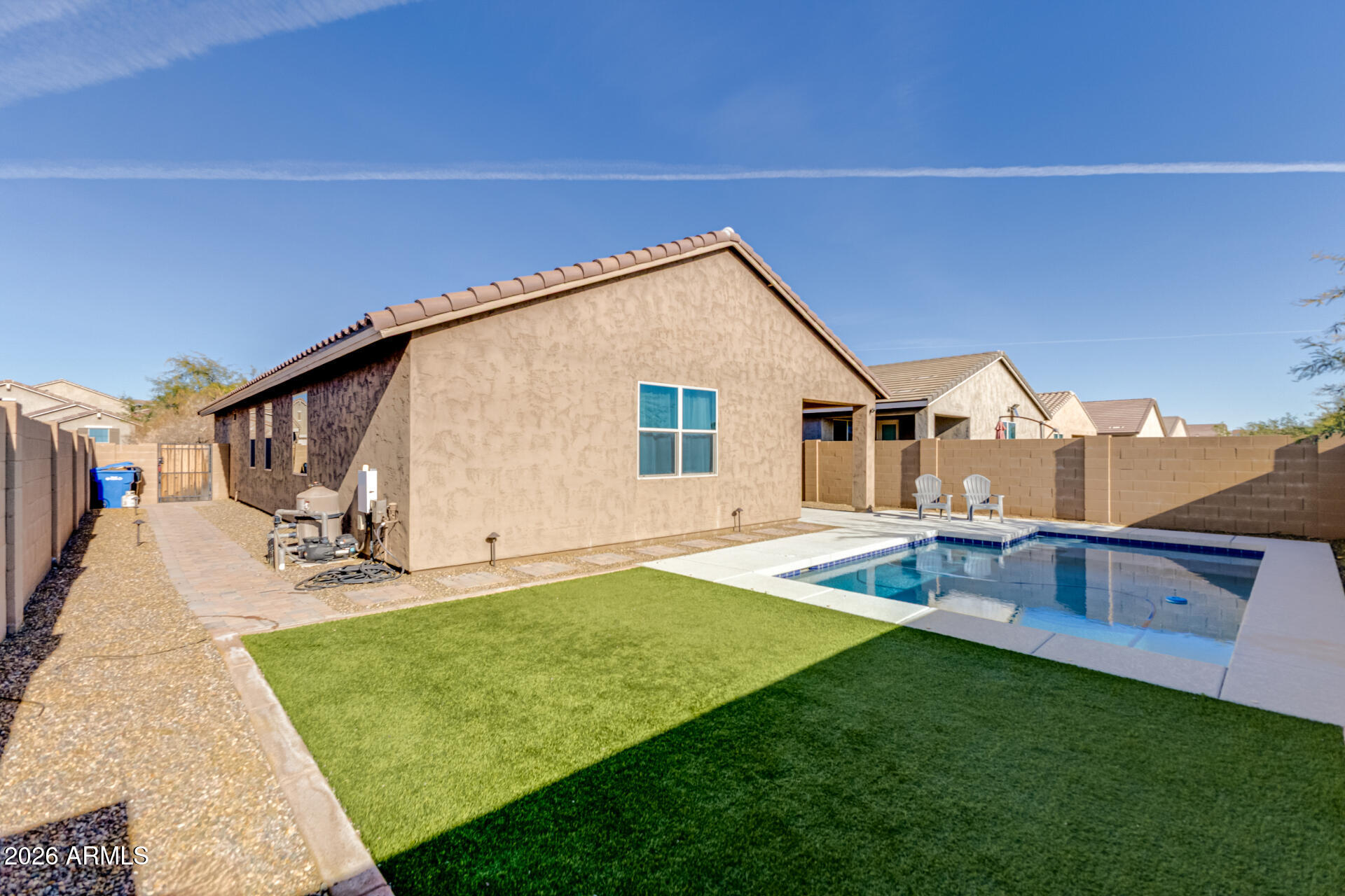2929 West Laredo Lane Phoenix, AZ 85085 - Photo 25 of 28 a backyard of a house with seating space