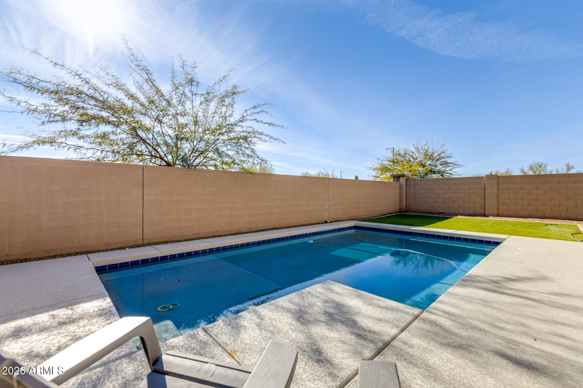 2929 West Laredo Lane Phoenix, AZ 85085 - Photo 27 of 28 a view of swimming pool with outdoor seating