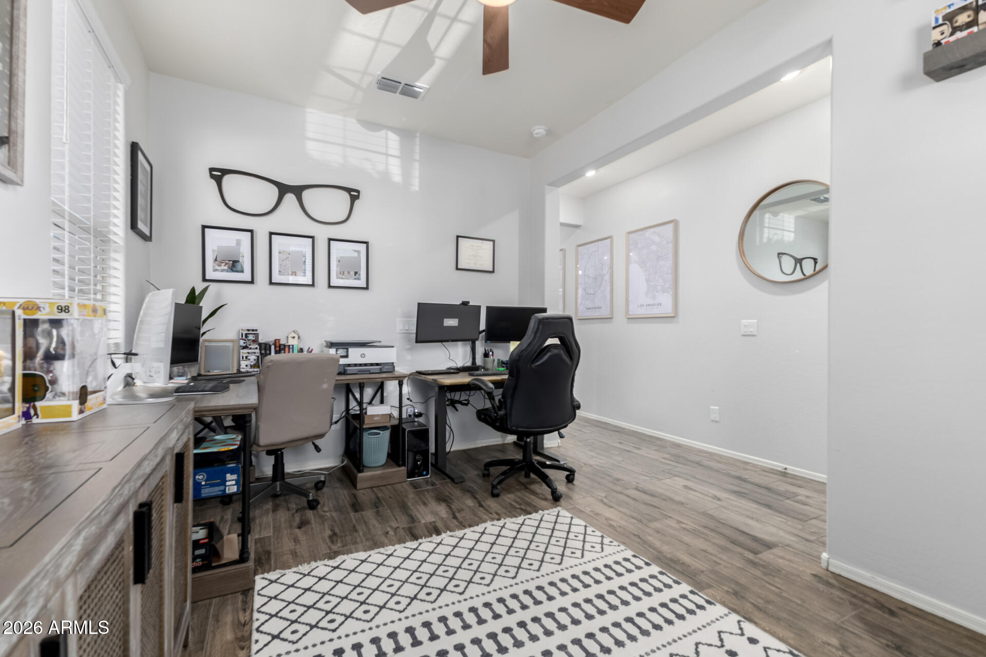 2929 West Laredo Lane Phoenix, AZ 85085 - Photo 4 of 28 a view of a dining room with furniture