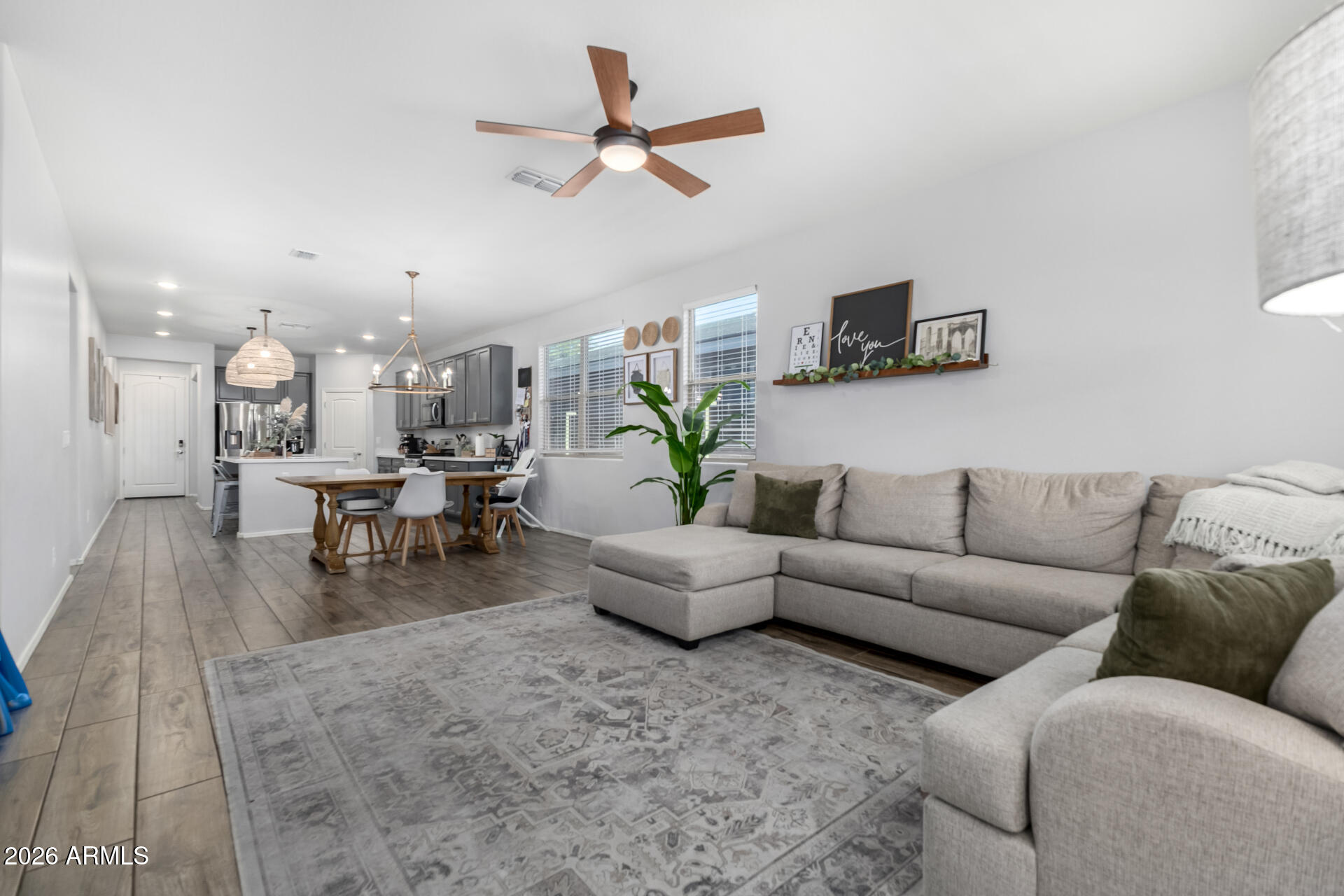 2929 West Laredo Lane Phoenix, AZ 85085 - Photo 6 of 28 a living room with furniture and kitchen view