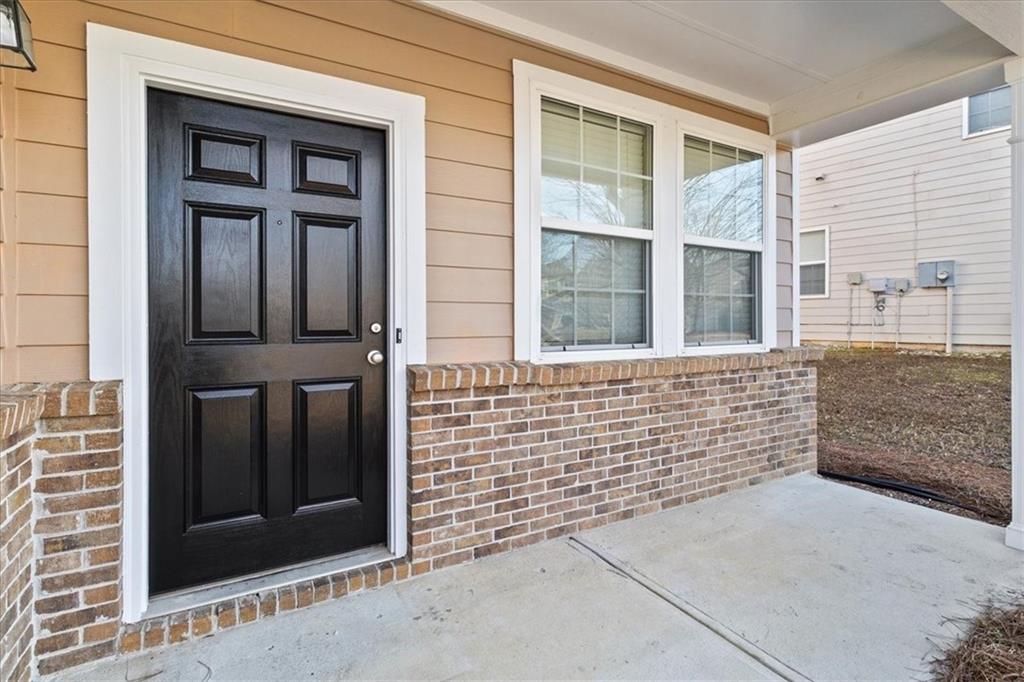 125 Parkmont Court Dallas, GA 30132 - Photo 5 of 36 front view of a house with a door