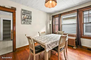 a kitchen with a stove and a refrigerator
