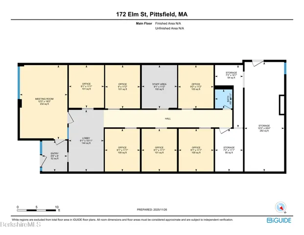 a view of a dining room with furniture and a potted plant