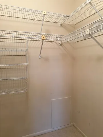 a view of a room with racks on the wall