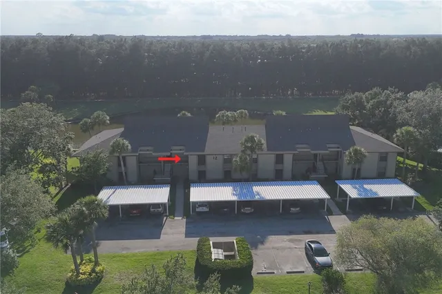 an aerial view of a house with a garden