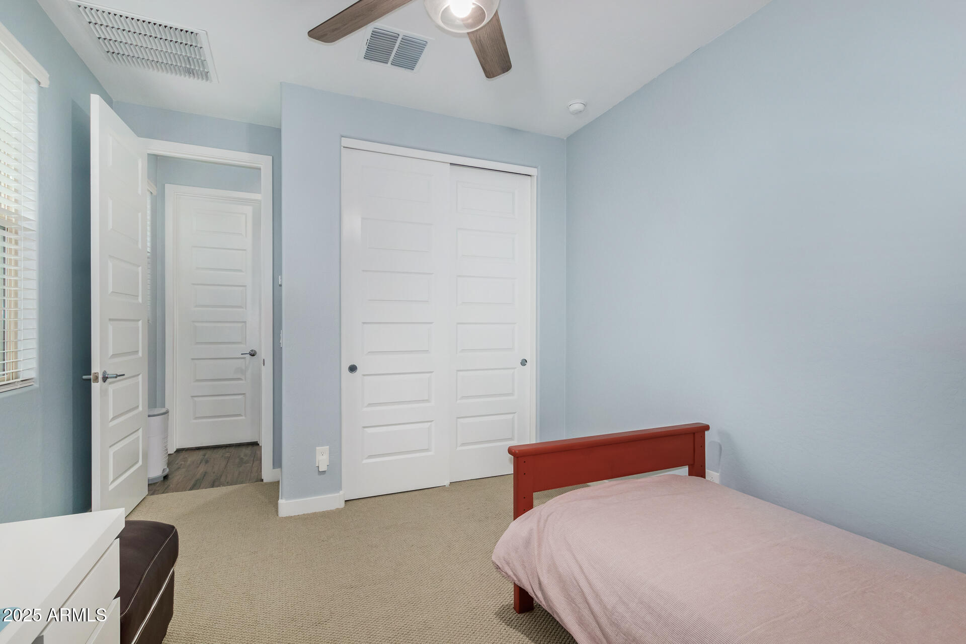 1171 East Armstrong Way Chandler, AZ 85286 - Photo 16 of 30 a bedroom with a bed and a chandelier fan