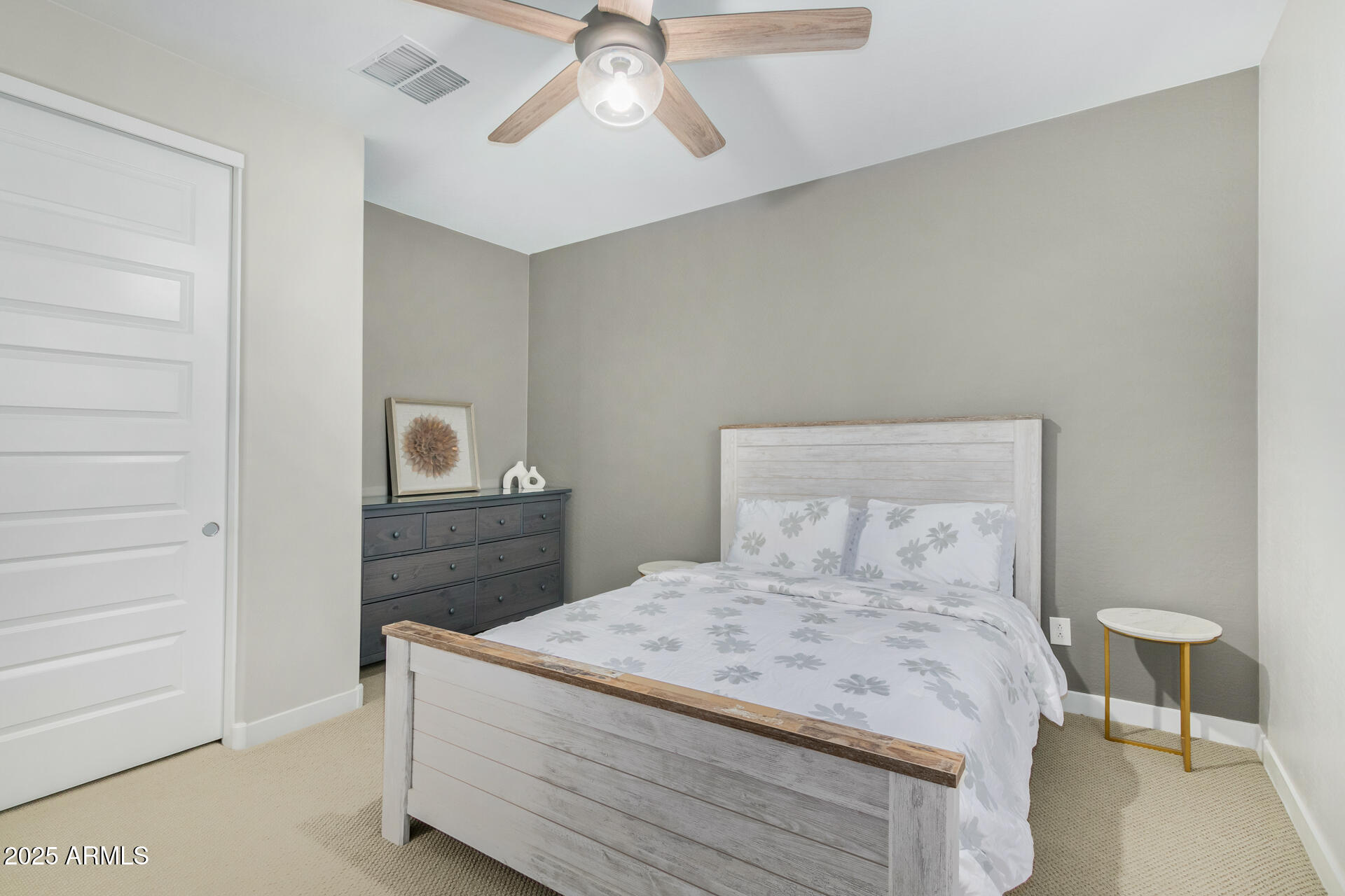 1171 East Armstrong Way Chandler, AZ 85286 - Photo 25 of 30 a bedroom with a bed and a table