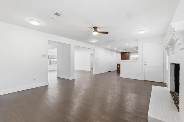 a view of a kitchen with a sink and a stove