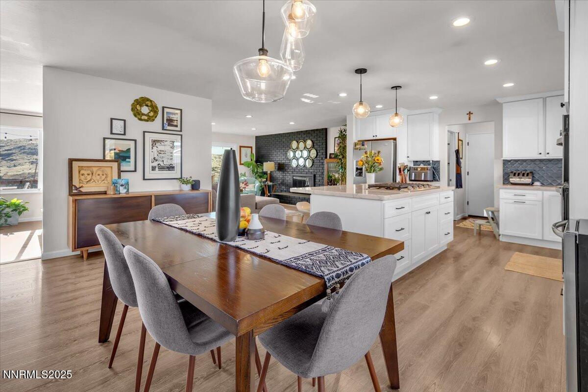 3880 Piccadilly Drive Reno, NV 89509 - Photo 11 of 58 a view of a dining room with furniture and wooden floor