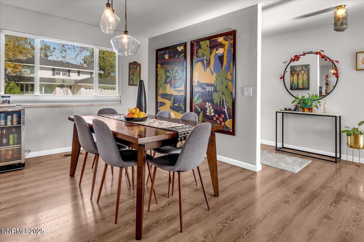 3880 Piccadilly Drive Reno, NV 89509 - Photo 18 of 58 a view of a dining room with furniture window and wooden floor