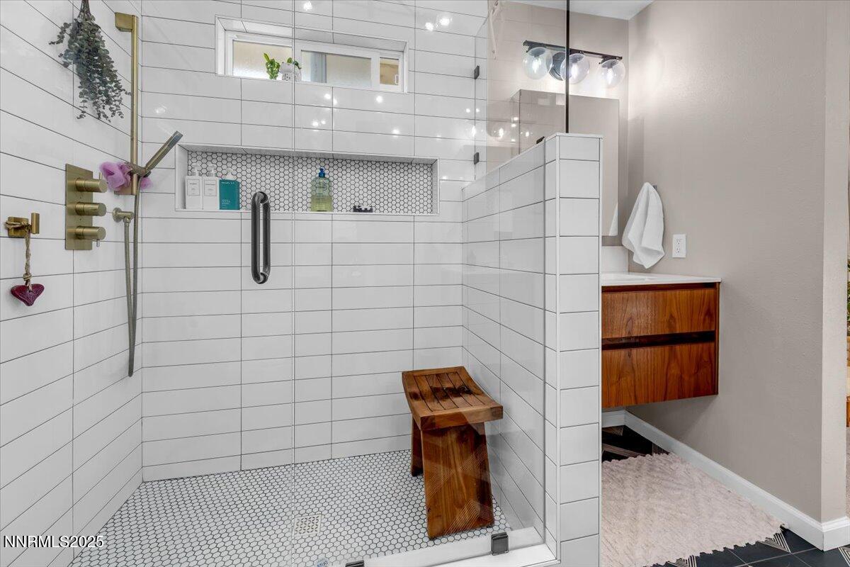 3880 Piccadilly Drive Reno, NV 89509 - Photo 30 of 58 a bathroom with a shower