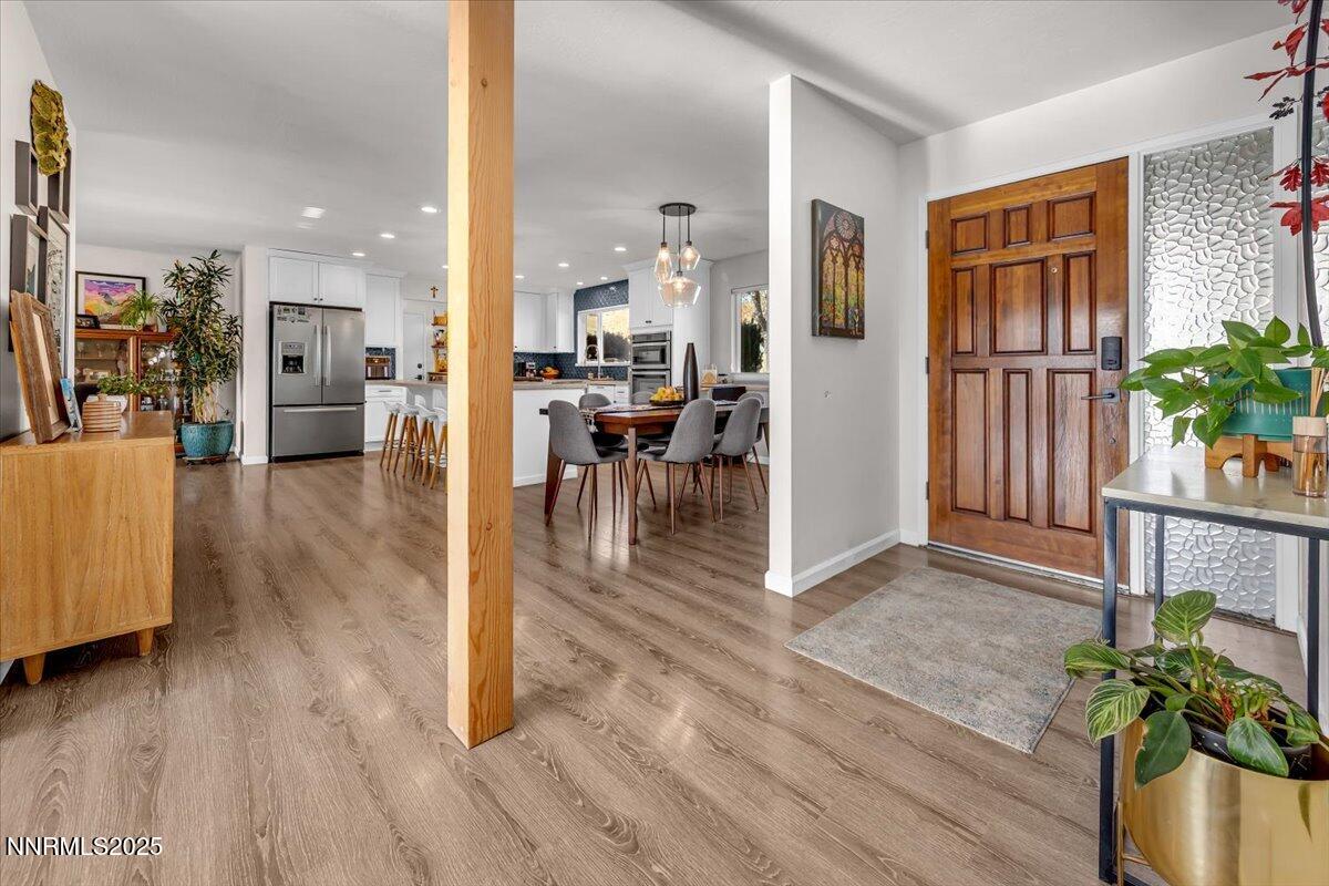 3880 Piccadilly Drive Reno, NV 89509 - Photo 4 of 58 a view of a living room and dining room