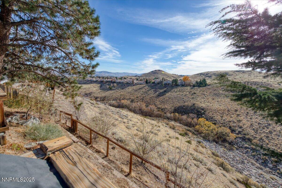 3880 Piccadilly Drive Reno, NV 89509 - Photo 47 of 58 a view of a mountain with a forest