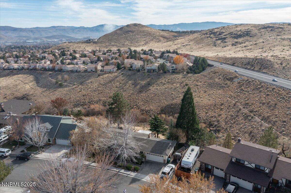 3880 Piccadilly Drive Reno, NV 89509 - Photo 54 of 58 a view of a terrace with a table and chairs