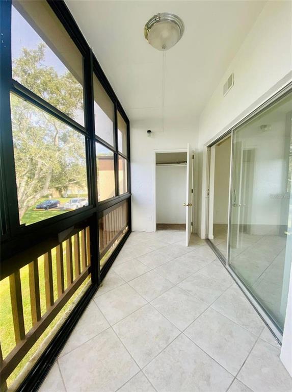 633 North Keene Road, Unit C Clearwater, FL 33755 - Photo 18 of 20 a view of an empty room with a window