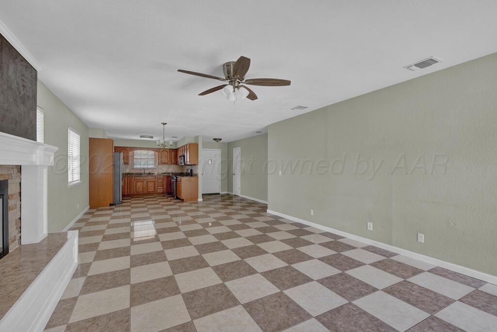 5406 Hillside Road Amarillo, TX 79109 - Photo 4 of 21 living room 2