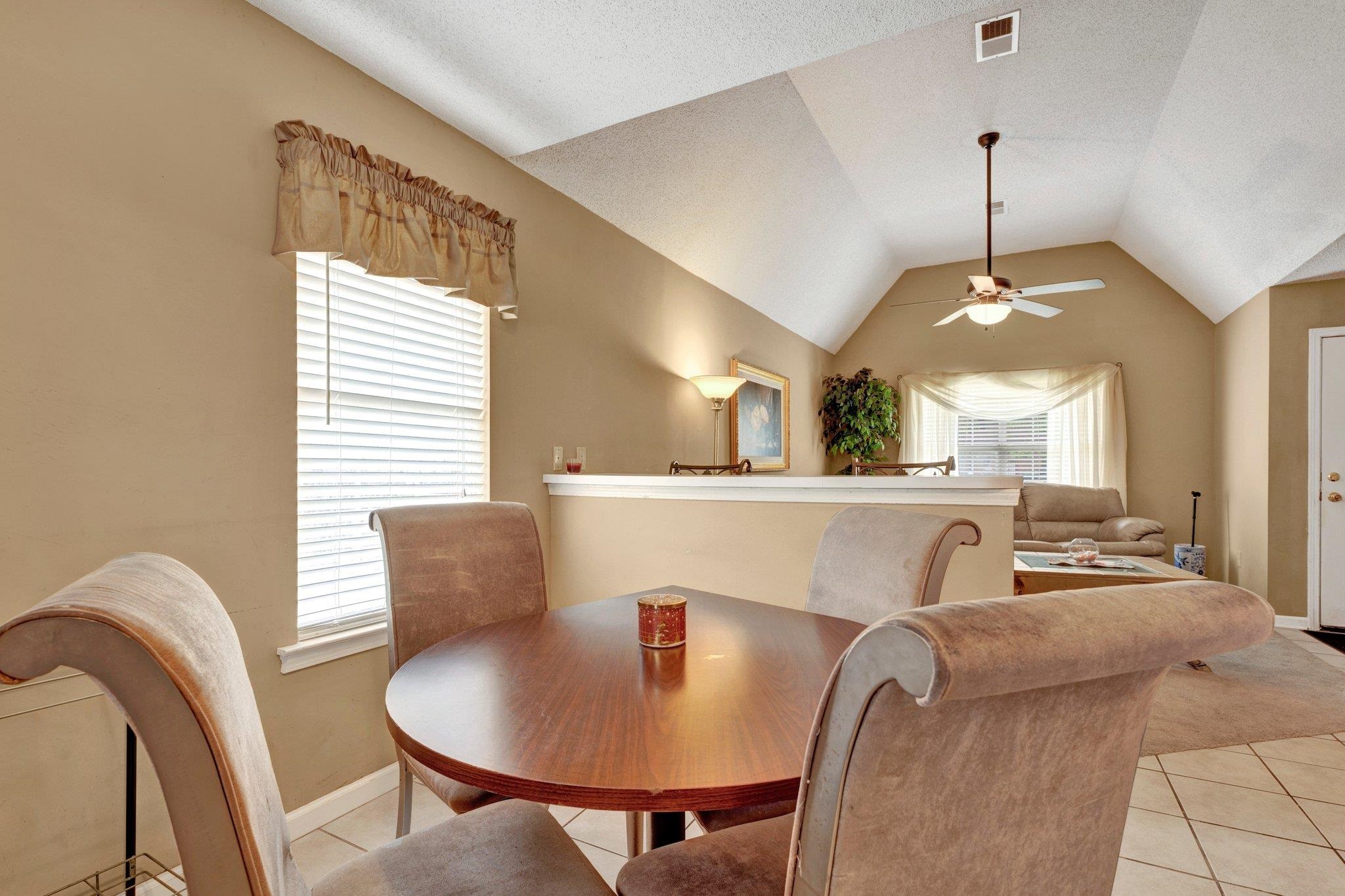 385 Boston Street Memphis, TN 38111 - Photo 4 of 11 a view of a dining room with furniture and window