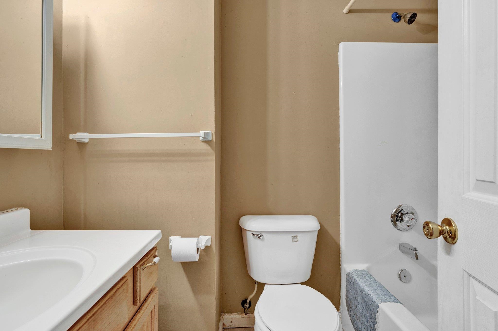 385 Boston Street Memphis, TN 38111 - Photo 7 of 11 a bathroom with a sink and a toilet