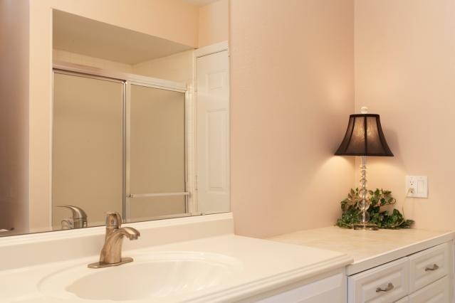 72300 Rodeo Way Rancho Mirage, CA 92270 - Photo 13 of 34 a bathroom with a sink and a mirror